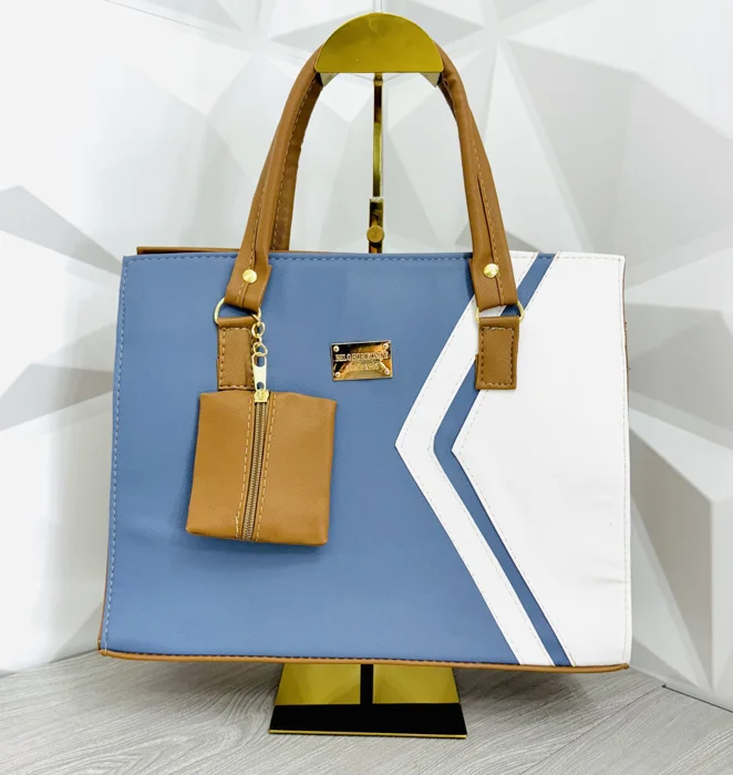 Bolsa tote chevron azul y blanco con monedero